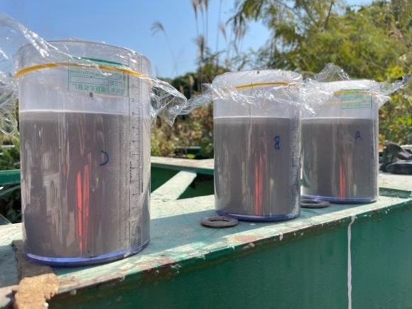 Grout sample cylinders under test