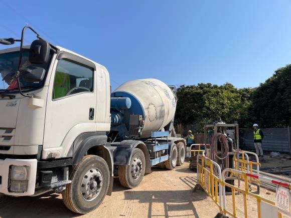 Ready-mix truck delivering GGBS grout
